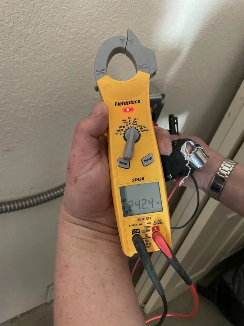 Voltage testing with clamp meter during Outlet Installation in Cottonwood
